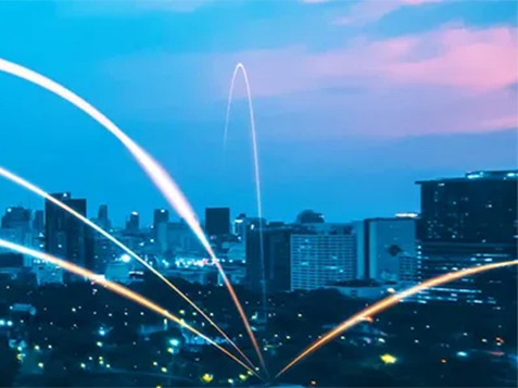 Cityscape against a blue evening sky