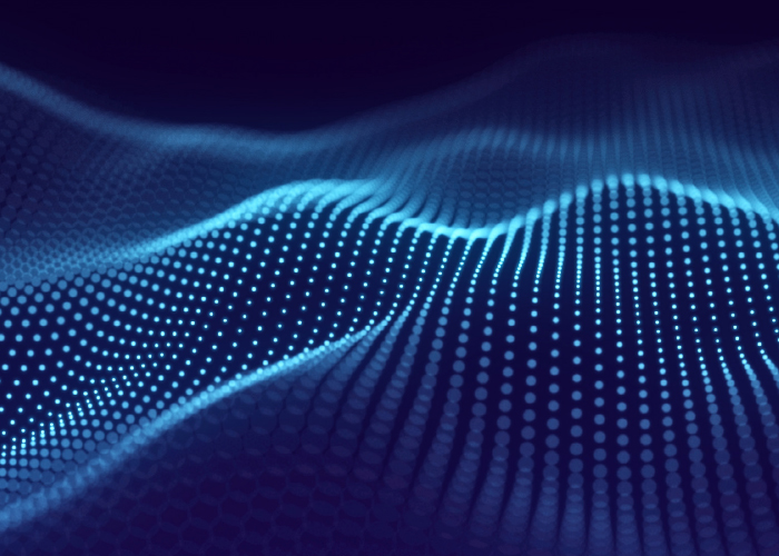Abstract wave pattern made of glowing blue particles